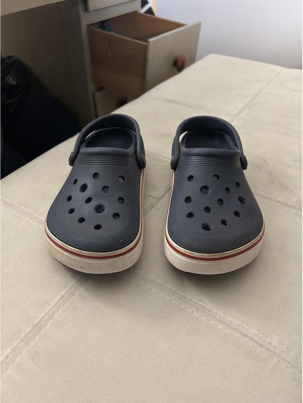Navy blue Bayaband Crocs clogs with red and white size trim size US kids 2